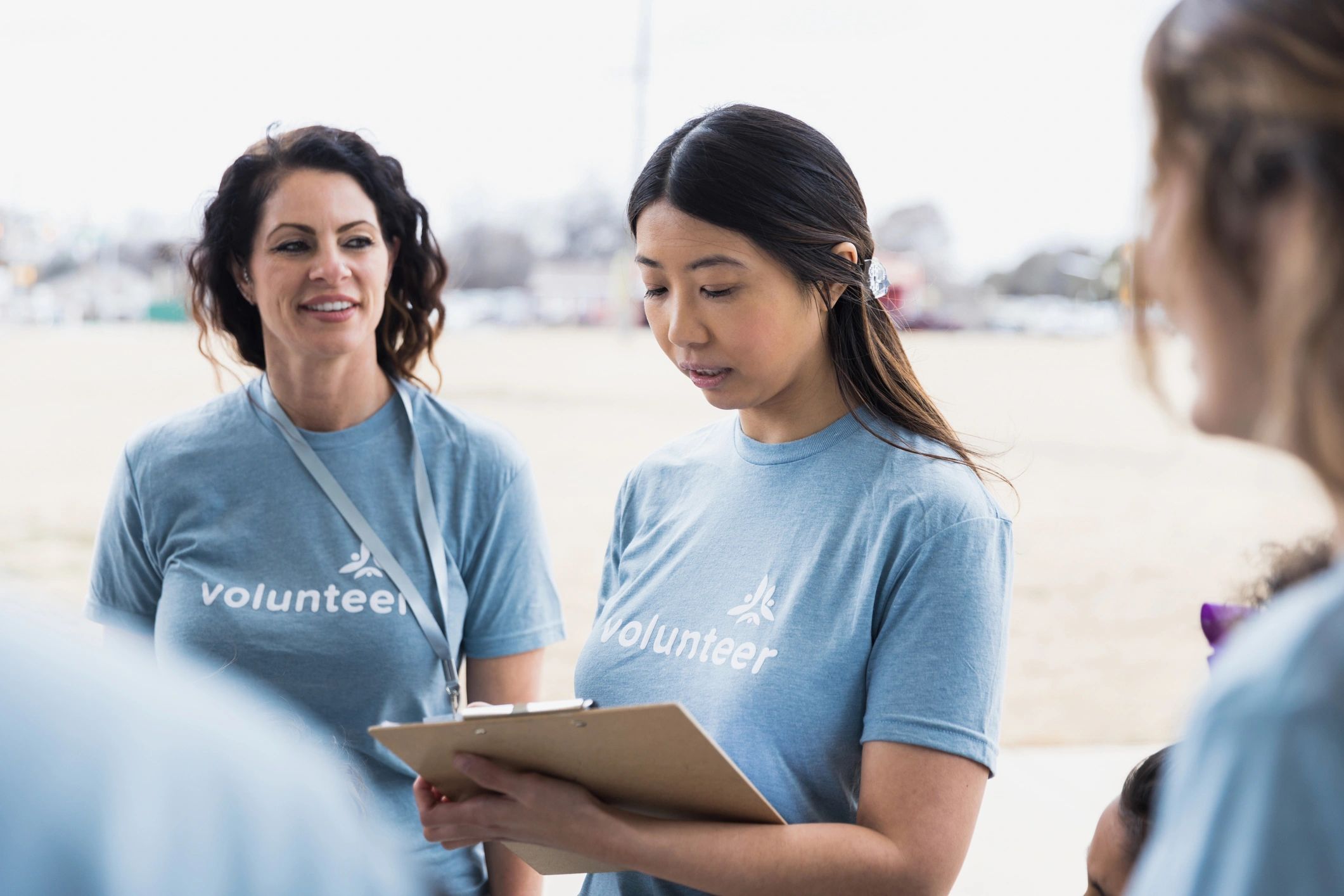 Young adult team leader supporting a volunteer event