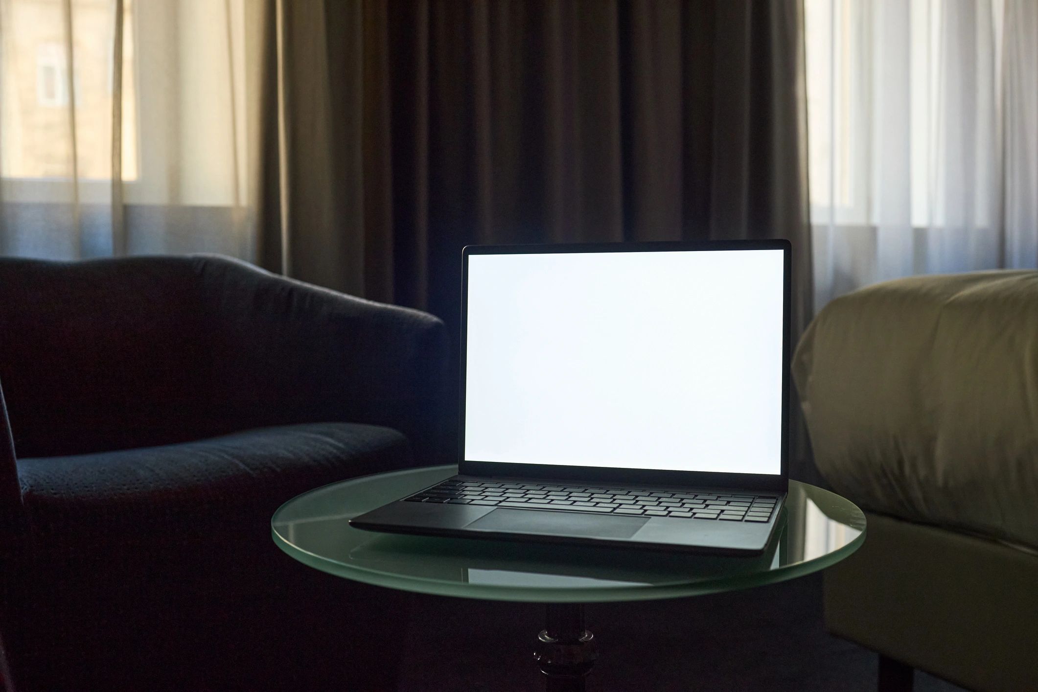 Laptop in a clean home office workspace